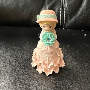 Charming Figurine with Pink Dress and Green Accents